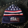 25th Anniversary Beanie - red, white, and blue knit cap