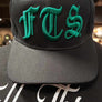 FTS Black flatbill flexfit hat with green embroidery - Autographed by Michael Ballard